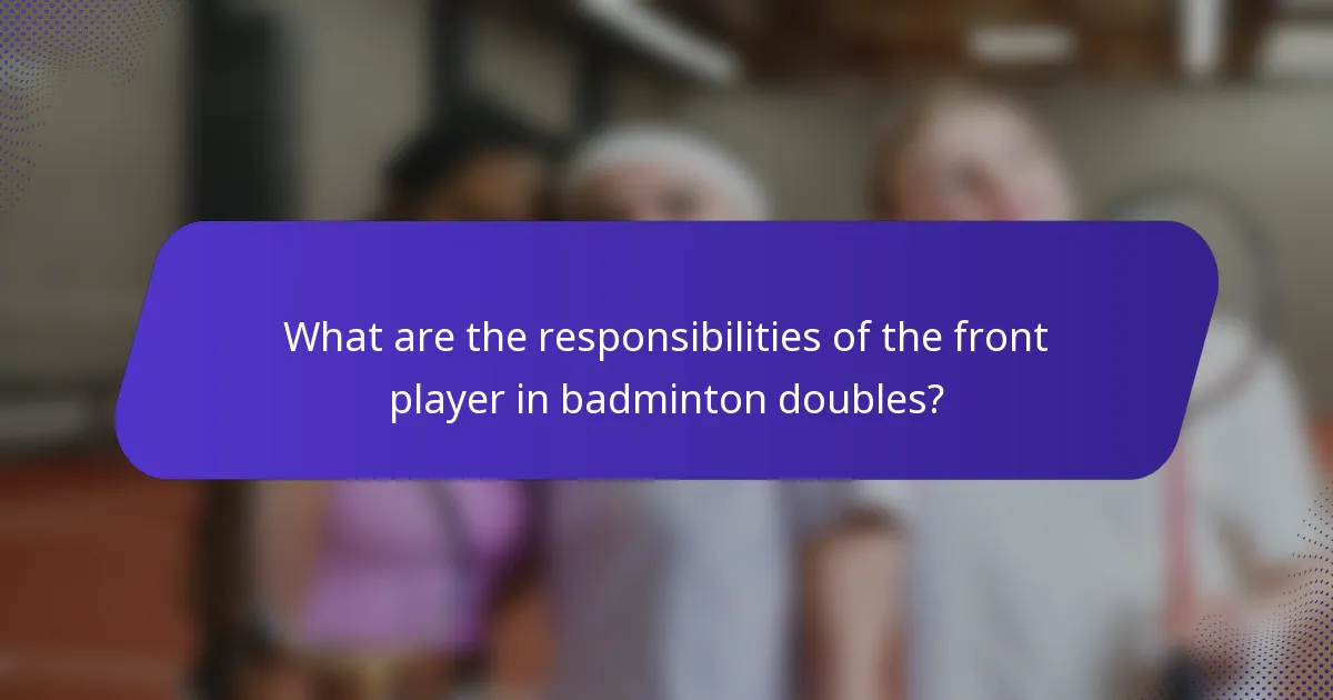 What are the responsibilities of the front player in badminton doubles?
